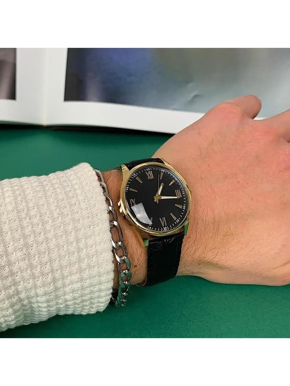 Minimalistic Black essential vintage style gold and leather style band watch. 9